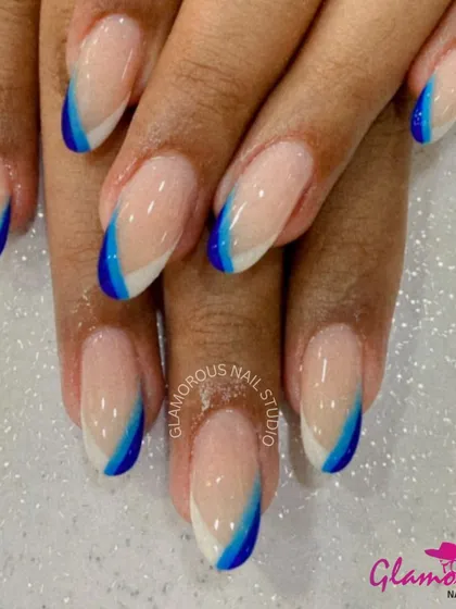 A beautiful and modern take on the French tip. This design features a gradient of deep blue to light blue, creating a "side French" effect that is both artistic and chic.