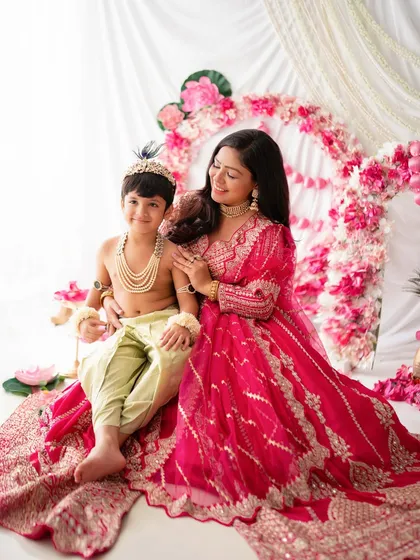Celebrating culture and family is so important. This mother and son Janmashtami themed photoshoot was a joy to create, with vibrant colors and traditional outfits. I love designing unique, festive setups for special occasions.