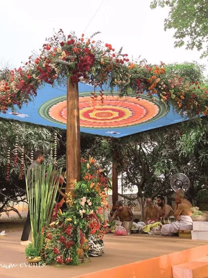 I believe in creating decor that tells a story. For this backyard wedding, the mandap ceiling features a custom-designed mandala inspired by the Madurai Meenakshi temple, a beautiful and personal tribute to the couple's heritage.
