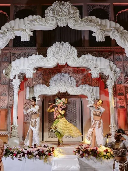 A performance of Raas Leela with dancers depicting Krishna, adding a divine and cultural touch to the wedding festivities. I often incorporate traditional art forms to enrich the celebration.