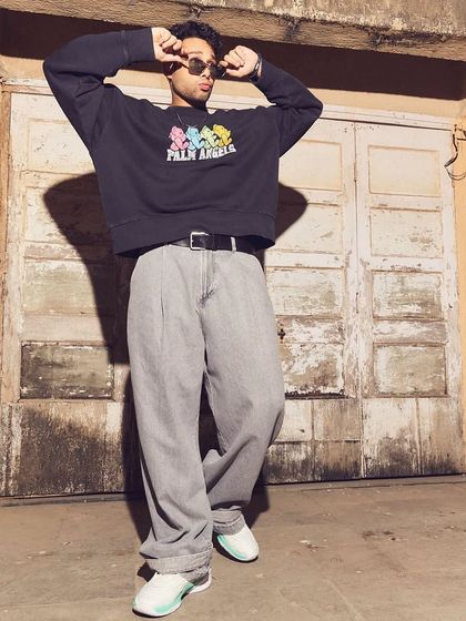 Capturing movement and attitude for HT Brunch. Siddhant Chaturvedi's pose brings the casual Palm Angels outfit to life, showing how styling is also about the energy of the person wearing the clothes.