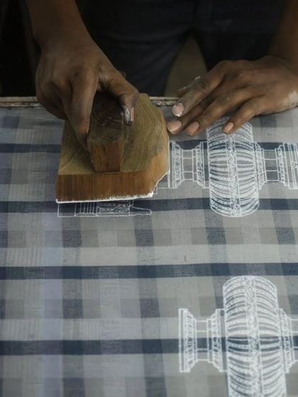 Our master printers recreated the stunning temple architecture of Hampi for the 'PAMPA' exhibition. Using historical sketches, they block printed these designs onto handwoven cotton-silk panels, a special project as one of our printers is from the Hampi region.