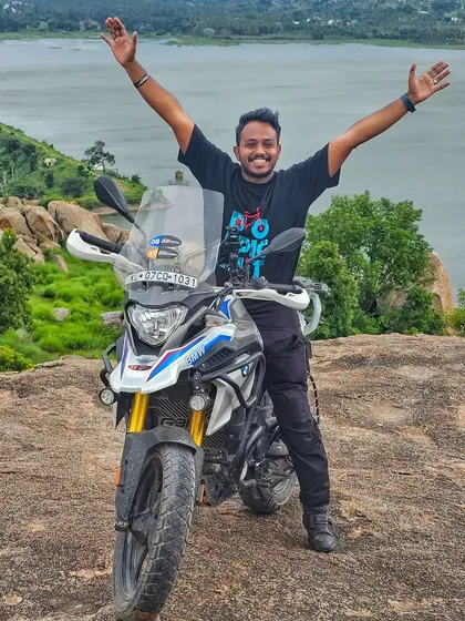 That feeling of conquering the trail and reaching the top. This is the freedom and joy we chase on every ride. Pure happiness with a scenic backdrop.