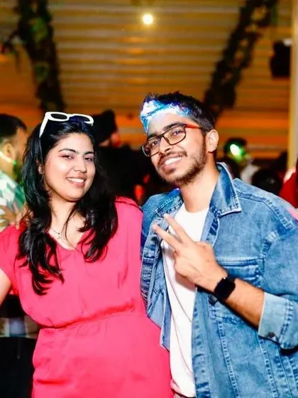 Friends posing with peace signs, enjoying the party atmosphere. I make sure my events are perfect for creating great memories with your squad.