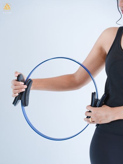 The Magic Circle is a classic Pilates prop that adds resistance to both mat and equipment exercises. It's fantastic for targeting the inner and outer thighs, as well as the arms and chest.