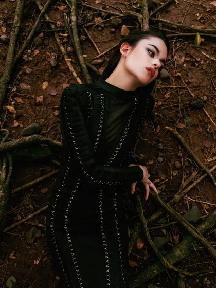 From our jungle expedition editorial for Mind Magazine. This shot uses the natural environment, with the model lying among tree roots, to create a raw and powerful fashion image.
