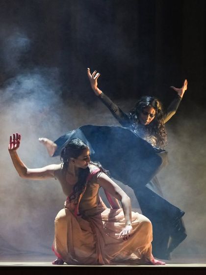 A dynamic duet sequence from 'Sitayana', showcasing a fusion of contemporary and martial arts-inspired movement. These pieces are choreographed to be both visually striking and emotionally resonant.