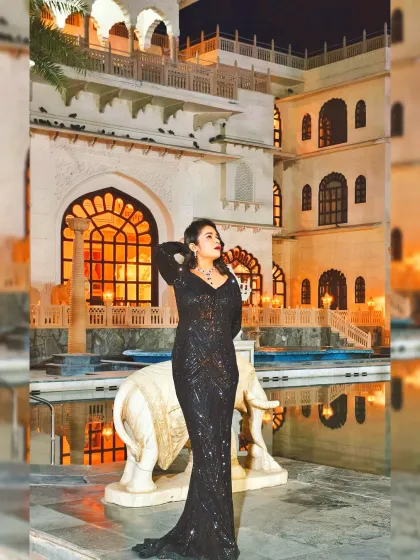 The poolside at Shiv Vilas lit up for a grand Sangeet. Hosting in such beautiful destination wedding venues is always a pleasure, and I make sure the event's energy matches the stunning surroundings.
