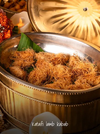 A close-up of one of my signature creations, the Kataifi Lamb Kabab. It’s a perfect example of how I love to play with textures and flavours, wrapping succulent lamb in a crispy, delicate nest.