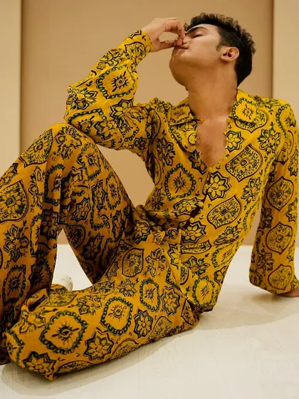 A high-fashion look for Niraj Patel. The makeup here is more stylized to match the designer outfit and the editorial concept of the photoshoot.