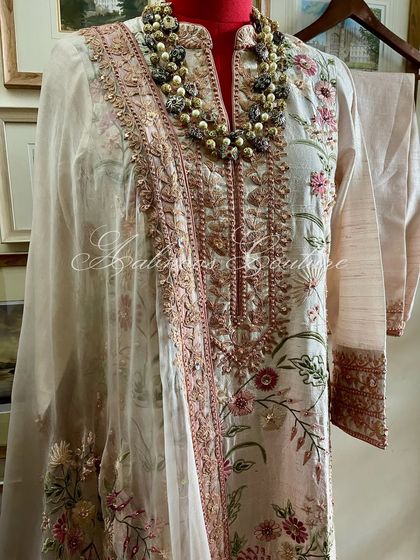 A three-quarter view of the suit, styled to show its elegance and modern appeal.