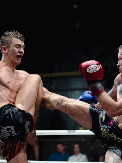 A glimpse from our 5-Day MMA Bootcamp, featuring a pro fighter landing a clean kick. We bring in international talent to elevate our training.