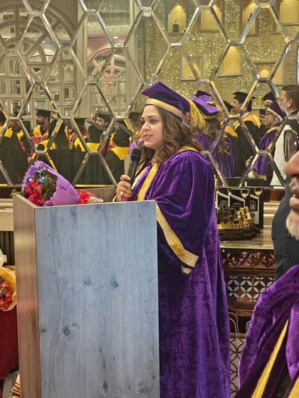 Addressing the audience as a Guest of Honour. Wearing the academic regalia, I felt a profound sense of responsibility to inspire the next generation of leaders and professionals.