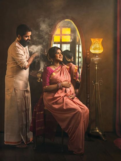 A duplicate of ID 2, this portrait captures the essence of my work: a timeless, painterly moment shared between two people awaiting their new arrival. We used a vintage gramophone and classic furniture in the studio to create this unique, rich composition.