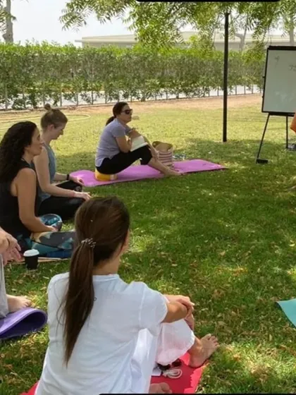 I conduct a Vedanta philosophy lecture outdoors during a yoga retreat in Dubai. We take advantage of the pleasant weather to connect with nature while studying the teachings.