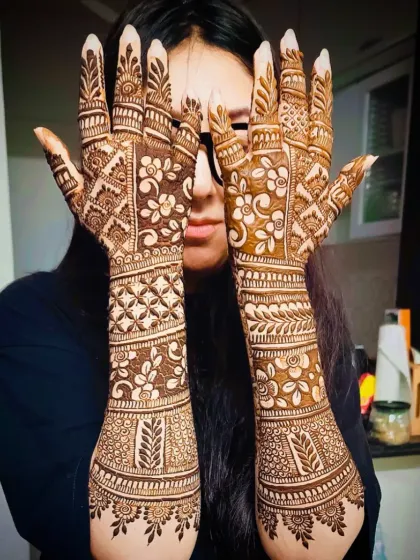 A beautiful full-coverage design perfect for an engagement, featuring dense floral and geometric patterns.