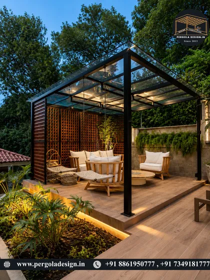 A perfect backyard sanctuary. This glass roof pergola, nestled in a lush garden and beautifully illuminated at dusk, creates an enchanting space for outdoor lounging and entertaining, blending nature with sophisticated design.
