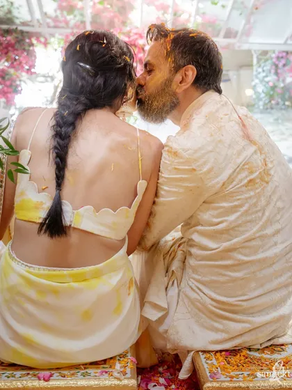An intimate kiss amidst the haldi celebrations. This tender moment between Nikki and Vishal shows that even in the middle of chaos, there is always room for love and affection.