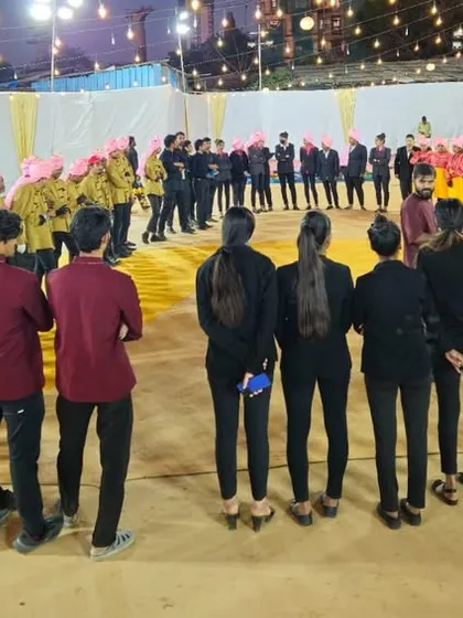 A group photo of our diverse event staff. From servers in traditional attire to managers in professional wear, everyone works together as one team.