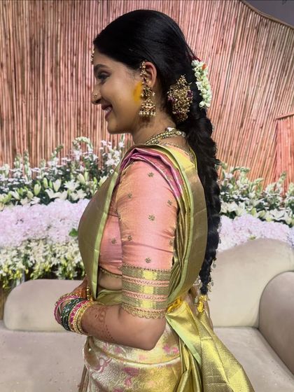 A candid shot of Akanksha, full of laughter and joy during her engagement ceremony.