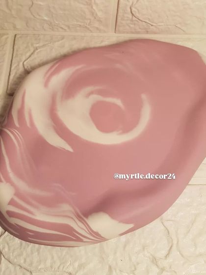 Our oval cloud tray in a soft and subtle mauve and white marble swirl. A perfect example of minimalist elegance.