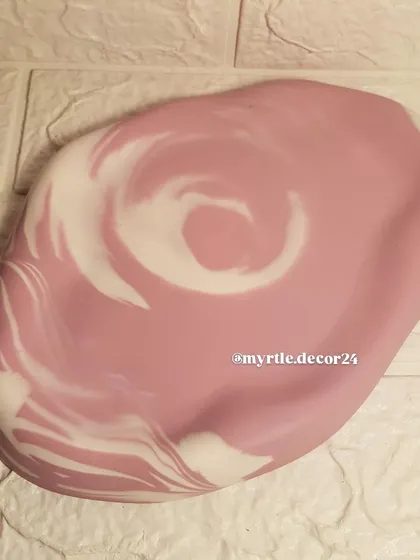 Our oval cloud tray in a soft and subtle mauve and white marble swirl. A perfect example of minimalist elegance.
