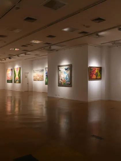 A wide shot of the gallery space on the opening day of "Fundamental Instincts." Seeing all the pieces hanging together brings the entire collection to life.