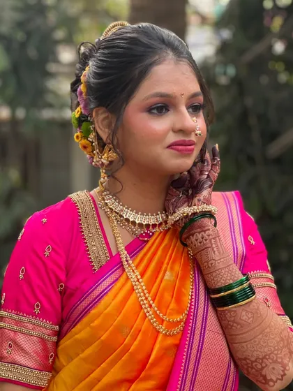 A candid moment capturing Siddhi's radiant smile and flawless makeup.