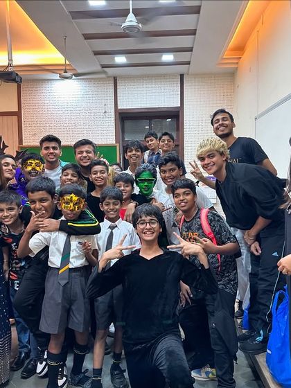 Posing with another group of performers. Each student brought their own unique personality to the stage, and it was my job to channel that into a cohesive and entertaining show.