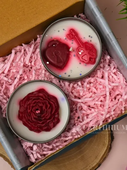 A romantic gift set with my 'Key to my Heart' and floral tin candles, nestled in pink shredded paper.