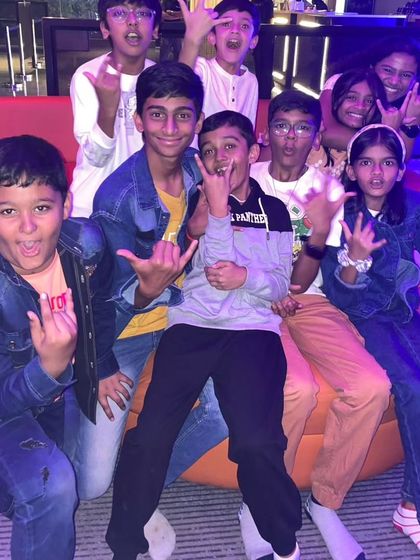 A group of kids rocking out at The Grid.