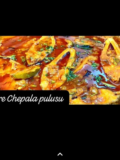 This is my personal favorite, the authentic Nellore Chepala Pulusu. It's a tangy and spicy fish curry made with a special blend of spices that gives it that true Nellore flavor.