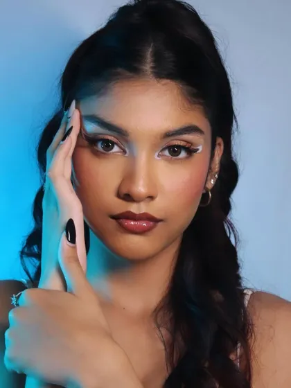 A powerful, direct-to-camera shot that showcases the confidence this makeup look inspires.