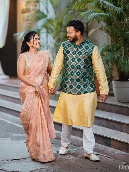 A glowing bride in a peach saree. This look is soft, radiant, and simply perfect, showcasing a beautiful option for an engagement or smaller ceremony.