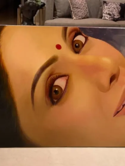 The final commissioned oil portrait of actress Sridevi, displayed in a home setting. This large-scale painting is designed to be a significant and personal piece of art for the client's space.