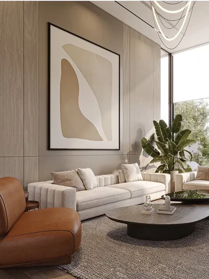 A soothing palette of neutral tones, sculptural lighting, and curated artwork converge to shape this captivating and inviting living space. Each element is thoughtfully placed to offer a serene retreat from the everyday.
