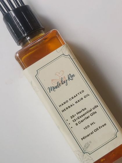 My Handcrafted Herbal Hair Oil is a powerhouse of natural ingredients. It's formulated with over 25 herbs, 12 essential oils, and 8 carrier oils, and is completely free of mineral oil. This is pure, concentrated nourishment for your hair.