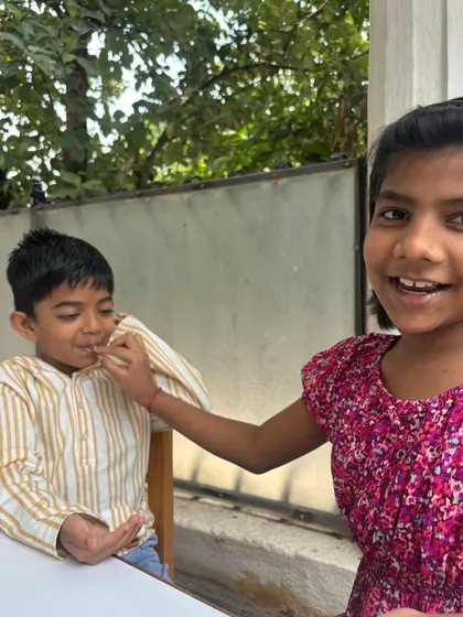 More moments from our Raksha Bandhan celebration, showing children tying rakhis and sharing sweets, learning about mutual care and respect.
