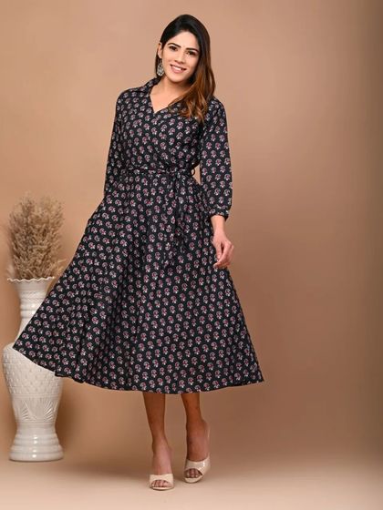 The women's black floral kurti dress, a timeless piece that can be dressed up or down.
