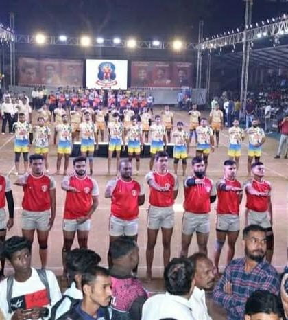 Both teams lined up for the national anthem before the start of the state-level tournament match.