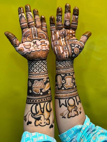 The reverse side of the "Mom" and "Dad" baby shower design, showing the complete artwork on the forearms.