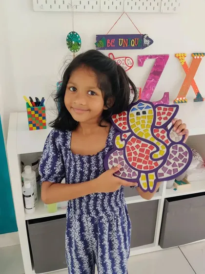 So proud of her finished Ganesha mosaic! My kits are a wonderful way for kids to create vibrant, personalized decor for festivals or just to brighten up their space.