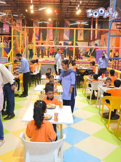A wide view of our café area, bustling with happy and hungry kids from a school trip refueling for their next adventure.