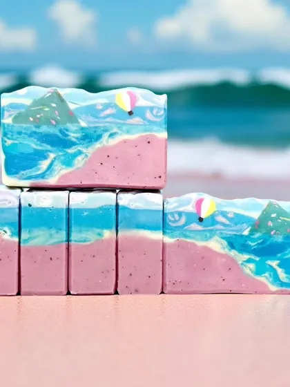My beach-themed soap enjoying a virtual vacation. The AI-generated background is fun, but the real beauty is in the handcrafted soap itself, made with coconut milk.