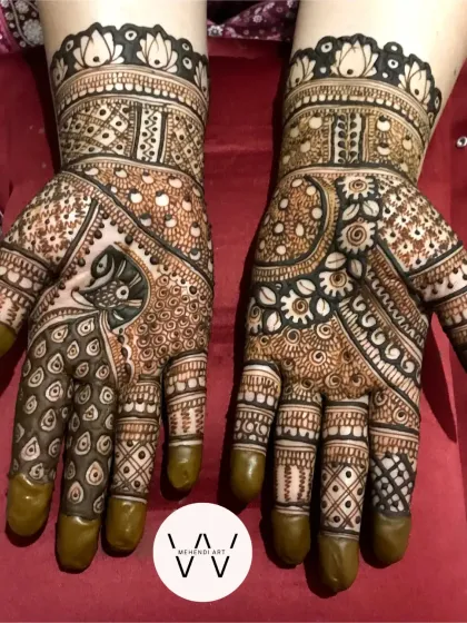 A clear, top-down view of the peacock henna for the 25th-anniversary celebration.