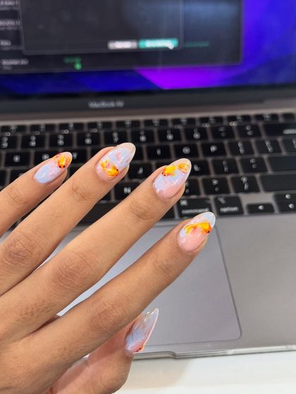 A full view of the goldfish nail art, perfect for anyone wanting a unique, ocean-inspired set.