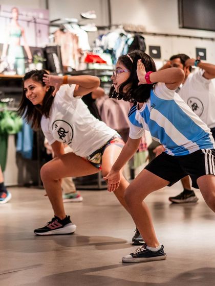 Getting our move on with the community. Here I am in a dance session with a young runner, part of our "Move For The Planet" initiative. Every bit of movement counts.