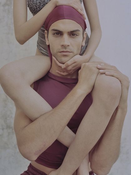 A conceptual shot exploring intimacy and form. The unusual composition, with one model's legs framing the other's face, is a testament to my experimental approach in personal projects and archival work.