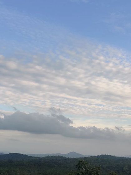 The beautiful cloud-filled sky over the hills, a common sight on our heritage treks.