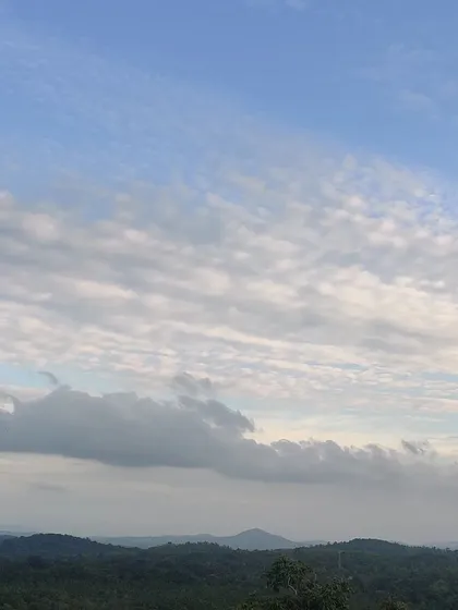 The beautiful cloud-filled sky over the hills, a common sight on our heritage treks.
